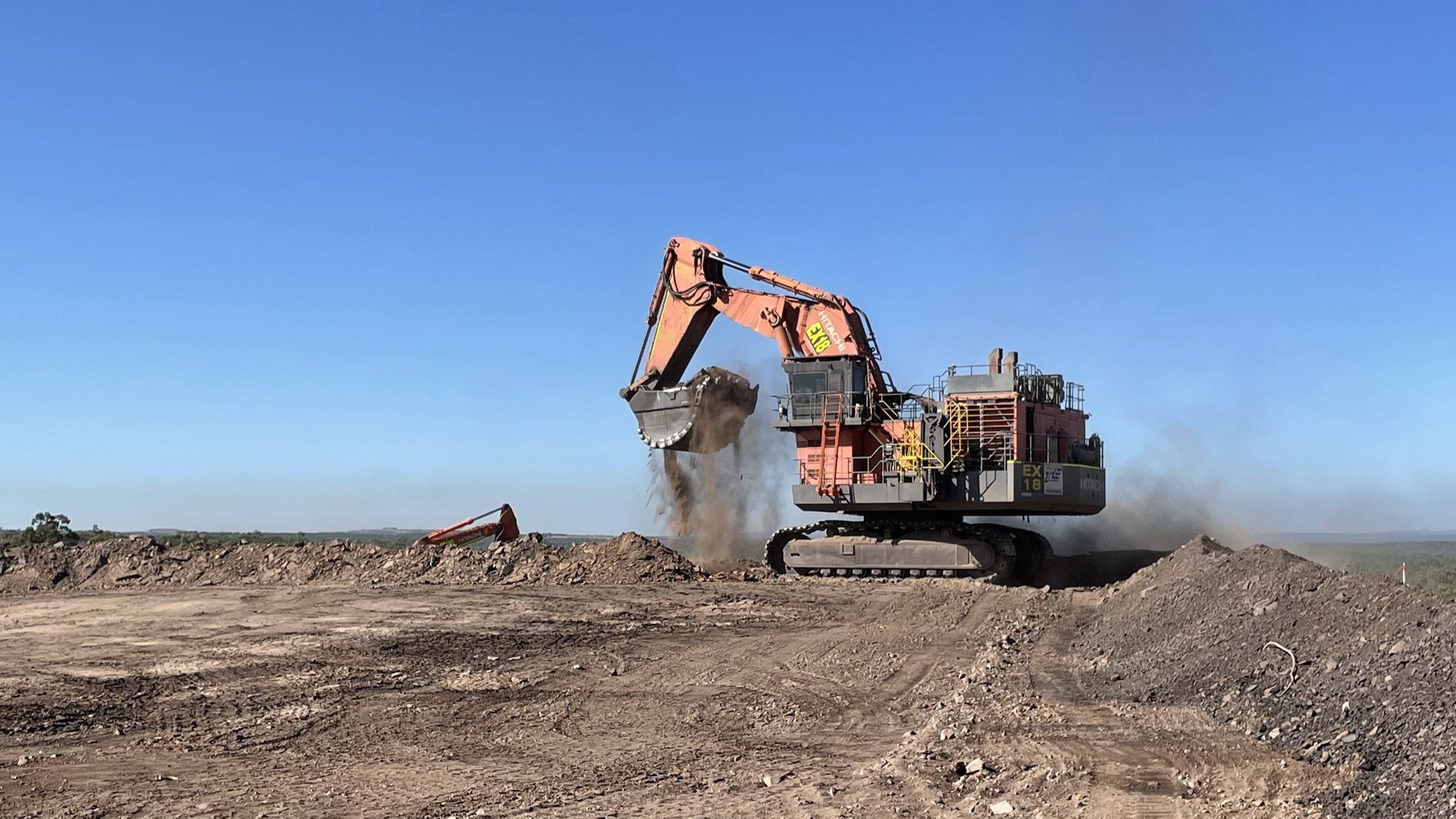 Hydraulic excavator beneath open sky